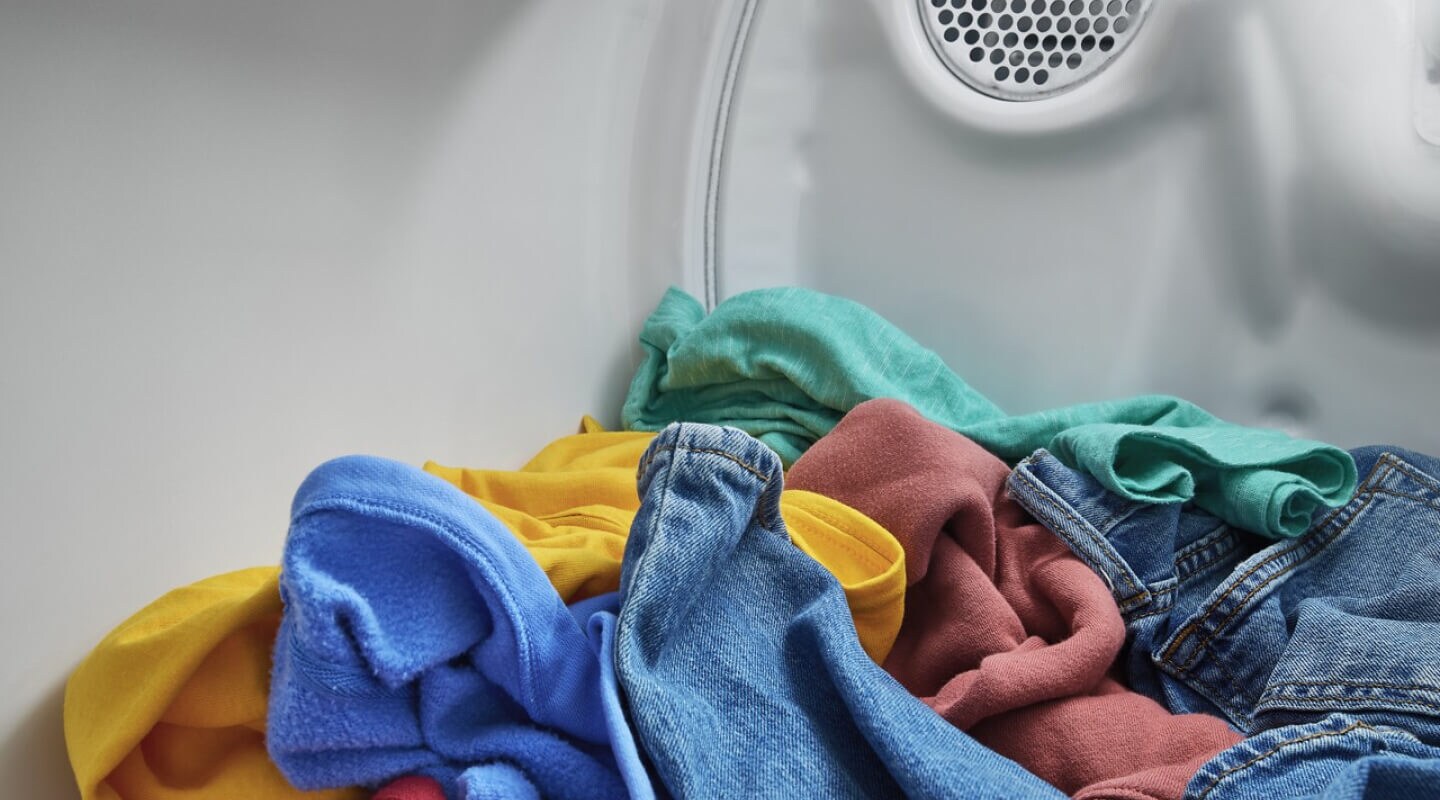 Colorful clothes in a dryer Colorful clothes in a dryer
