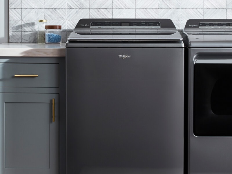 Top load Whirlpool® washer in a laundry room Top load Whirlpool® washer in a laundry room