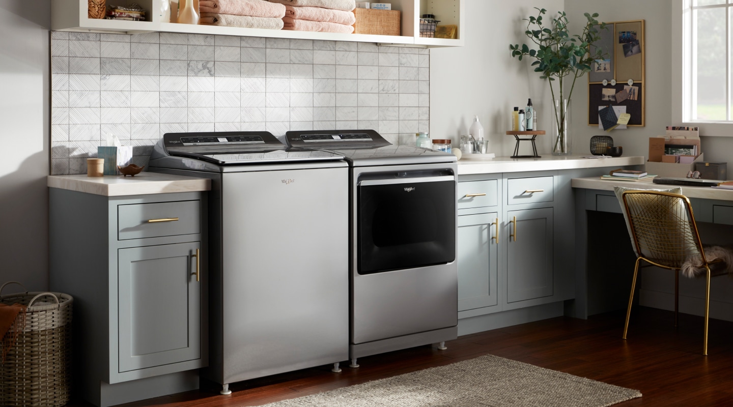 A washer and dryer set in a laundry room A washer and dryer set in a laundry room