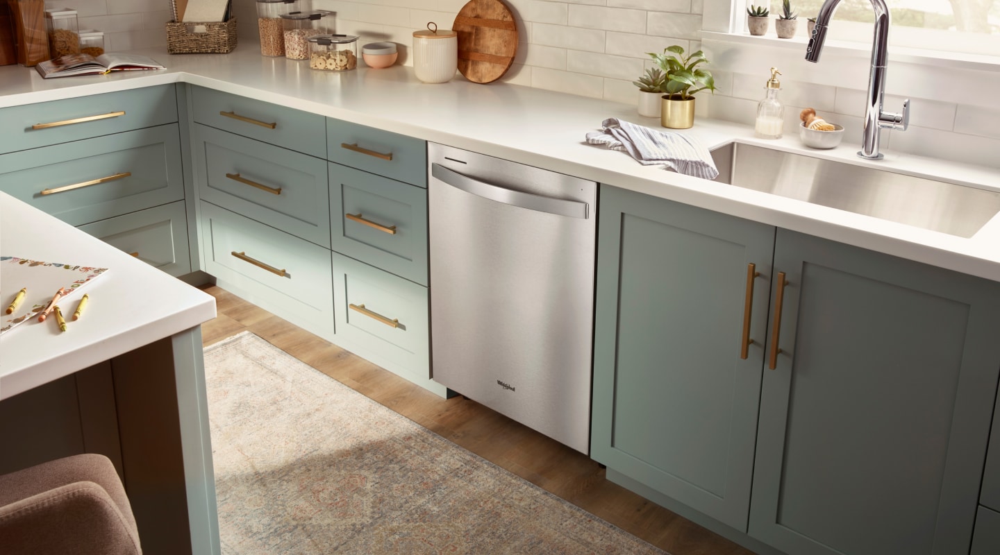 Stainless steel Whirlpool® Dishwasher in blue cabinetry Stainless steel Whirlpool® Dishwasher in blue cabinetry