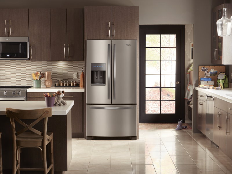 Stainless steel Whirlpool® French door refrigerator in a modern kitchen Stainless steel Whirlpool® French door refrigerator in a modern kitchen