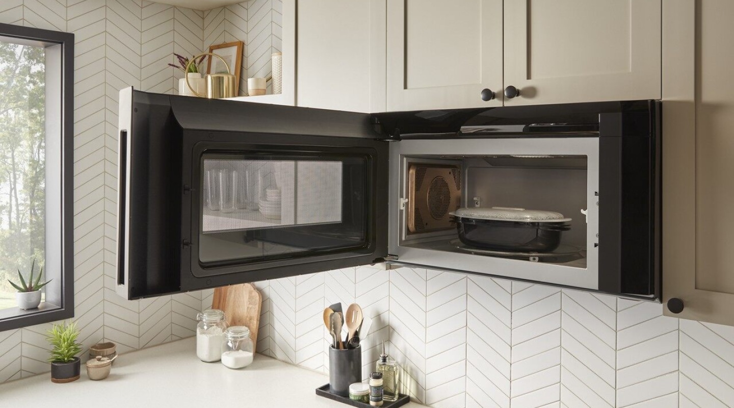 Open Whirlpool® Microwave with steaming container