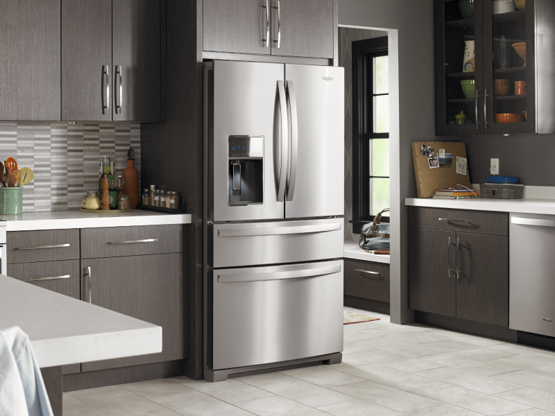 Stainless steel Whirlpool® french door refrigerator in a modern kitchen Stainless steel Whirlpool® french door refrigerator in a modern kitchen