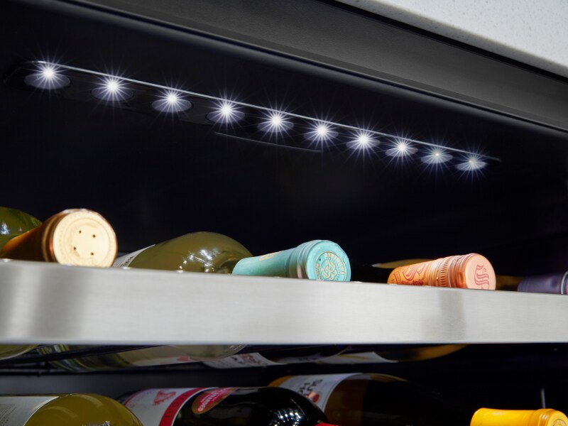 Wine bottles stored in a wine cooler Wine bottles stored in a wine cooler