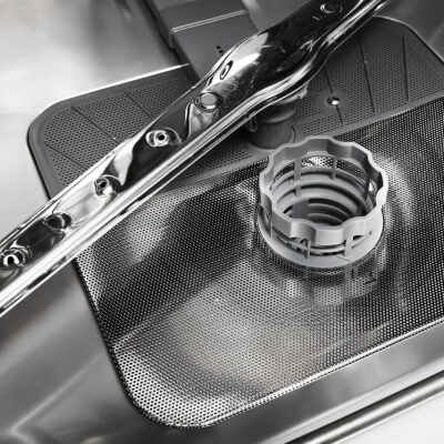 A closeup of a dishwasher filter