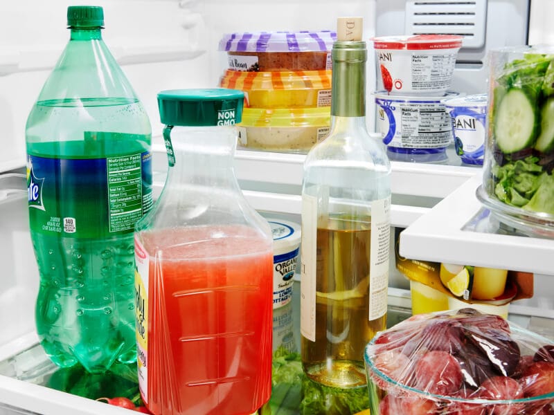 Food items on a refrigerator shelf Food items on a refrigerator shelf