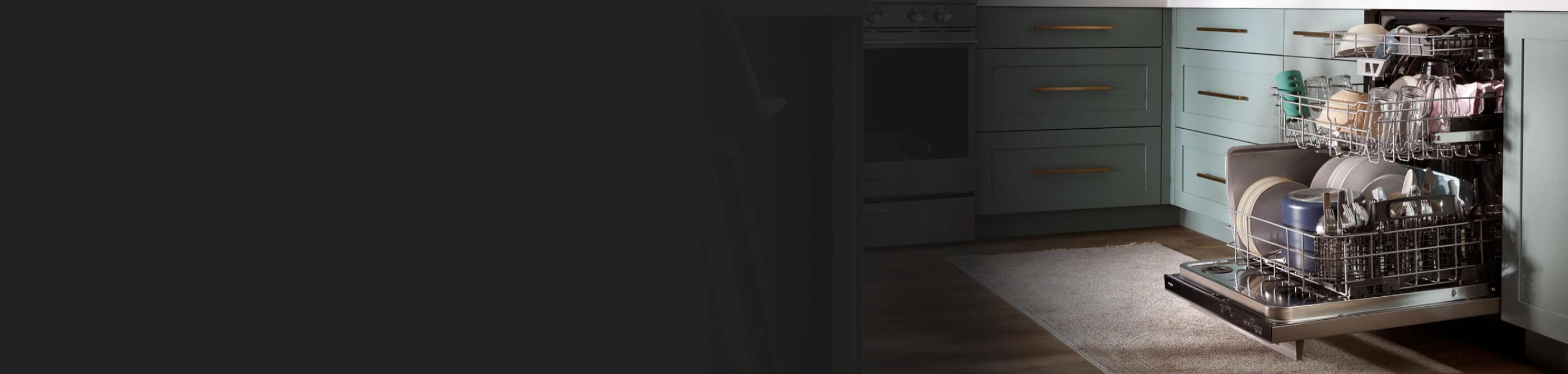 Open 3rd rack dishwasher with racks pulled out and full of dishes