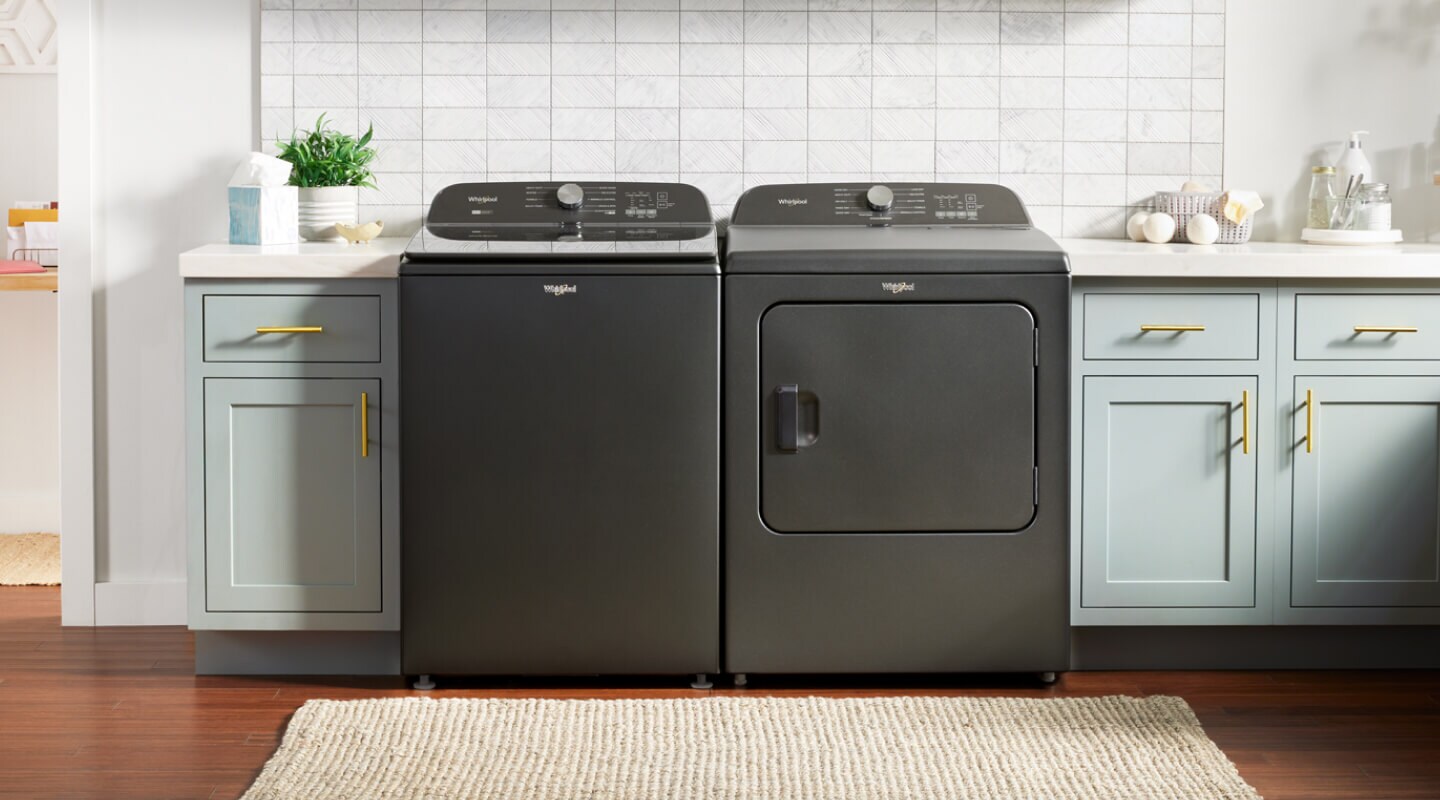 Matte black top load Whirlpool® Washer with matching dryer