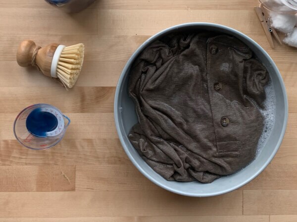 Shirt soaking in a basin