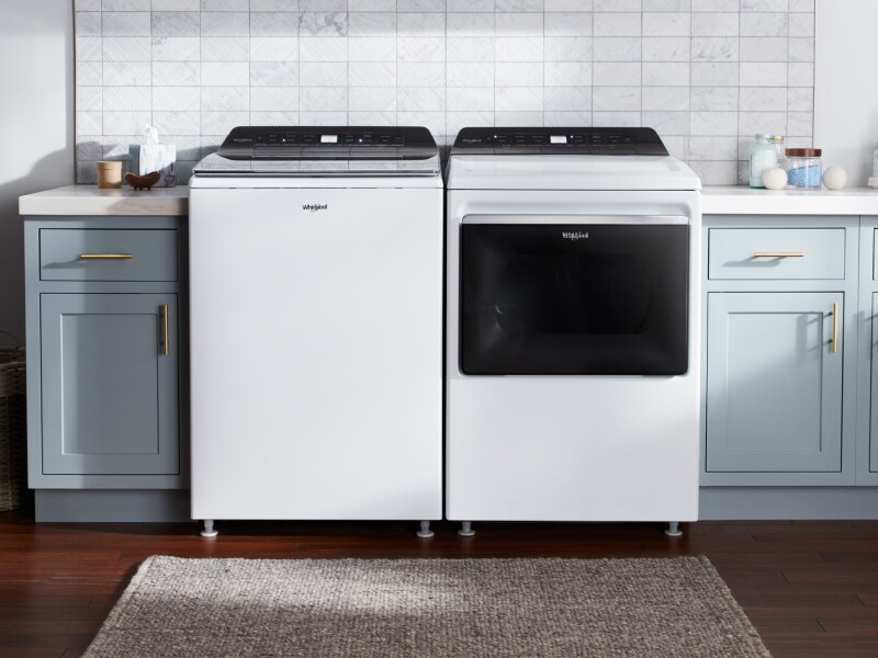 White Whirlpool® top loading washer and dryer White Whirlpool® top loading washer and dryer