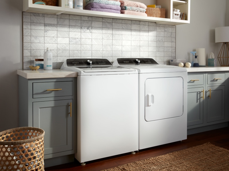A white Whirlpool® washer and dryer set. A white Whirlpool® washer and dryer set.