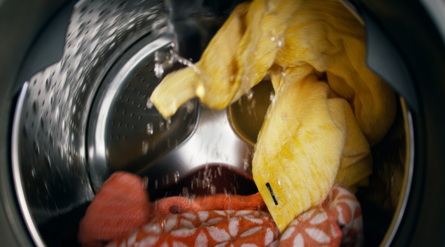 Clothes in a washing machine Clothes in a washing machine