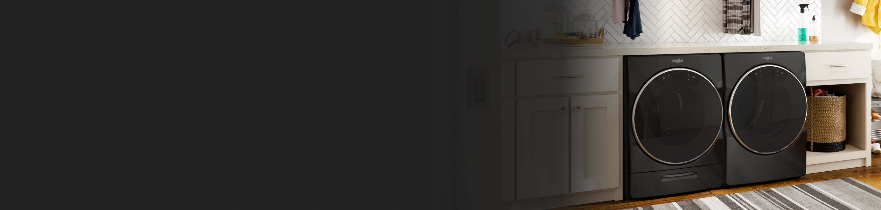 A washer and dryer set in a laundry room