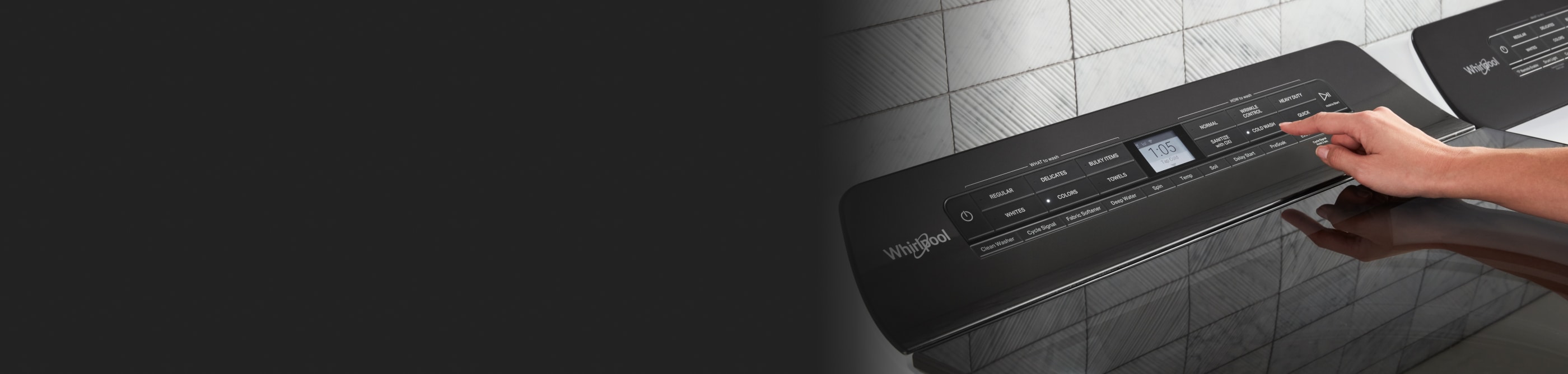 A person making a selection on a Whirlpool® washer