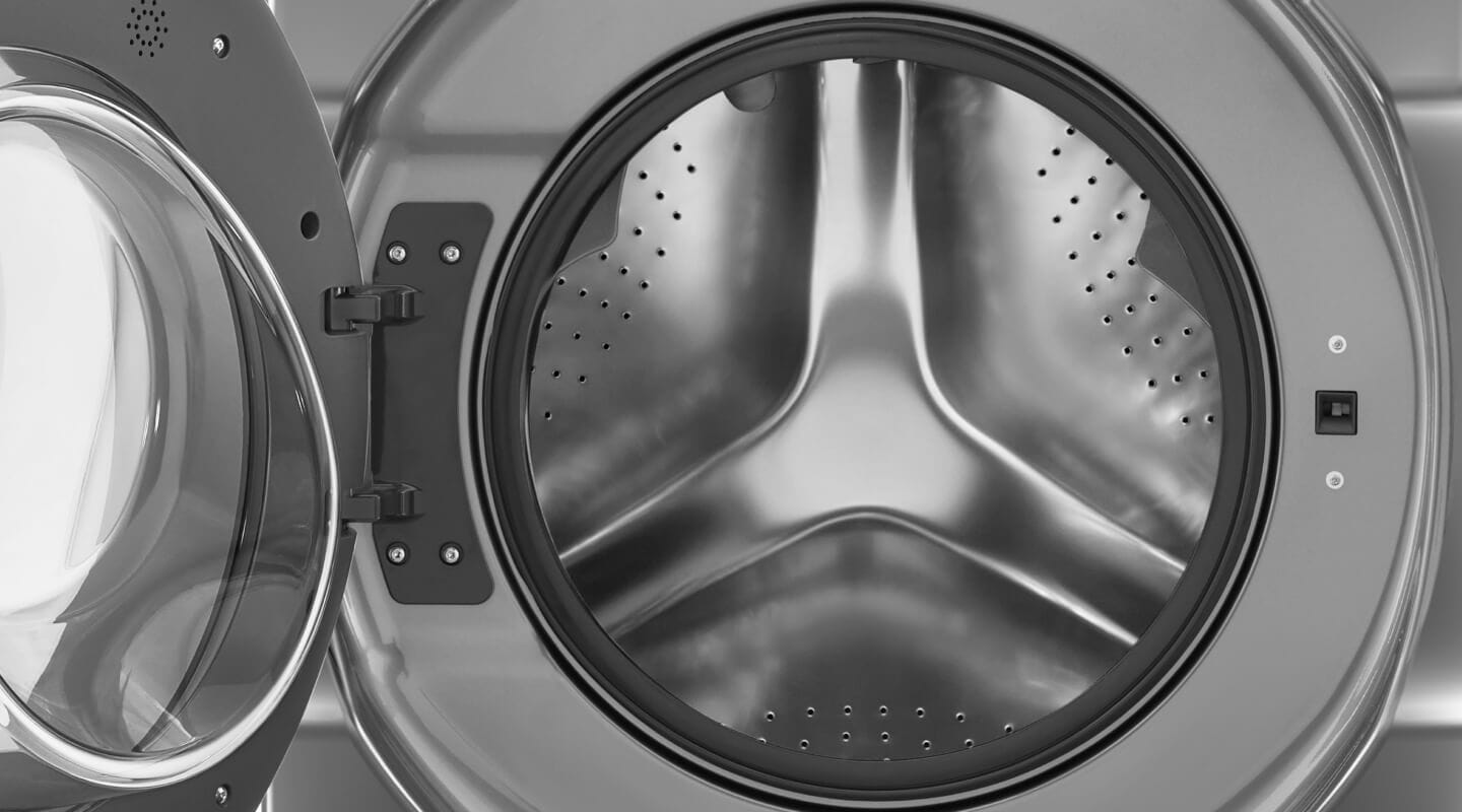 A Whirlpool® dryer with an open door A Whirlpool® dryer with an open door
