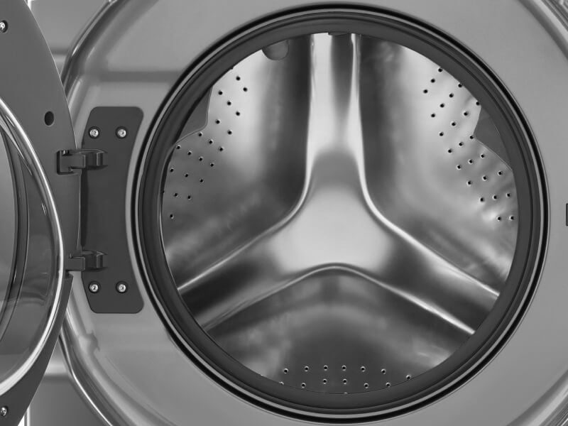 A Whirlpool® dryer with an open door A Whirlpool® dryer with an open door