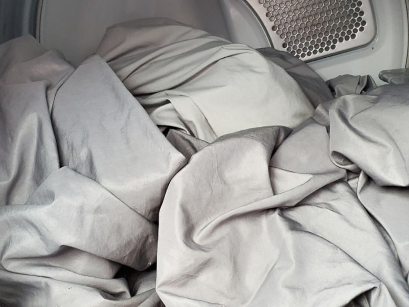 Interior of Whirlpool® dryer with sheets Interior of Whirlpool® dryer with sheets