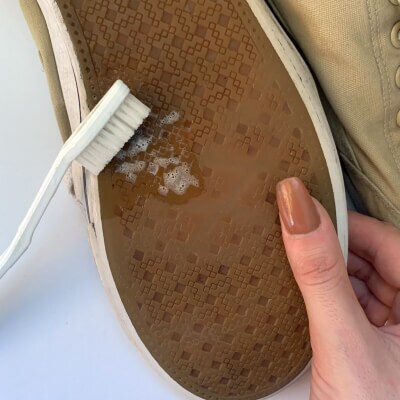 Preparing shoes to wash in the washing machine