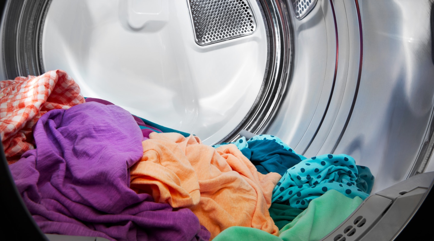 Dry clothes in a dryer drum Dry clothes in a dryer drum