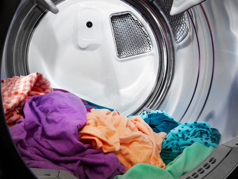 Dry clothes in a dryer drum Dry clothes in a dryer drum