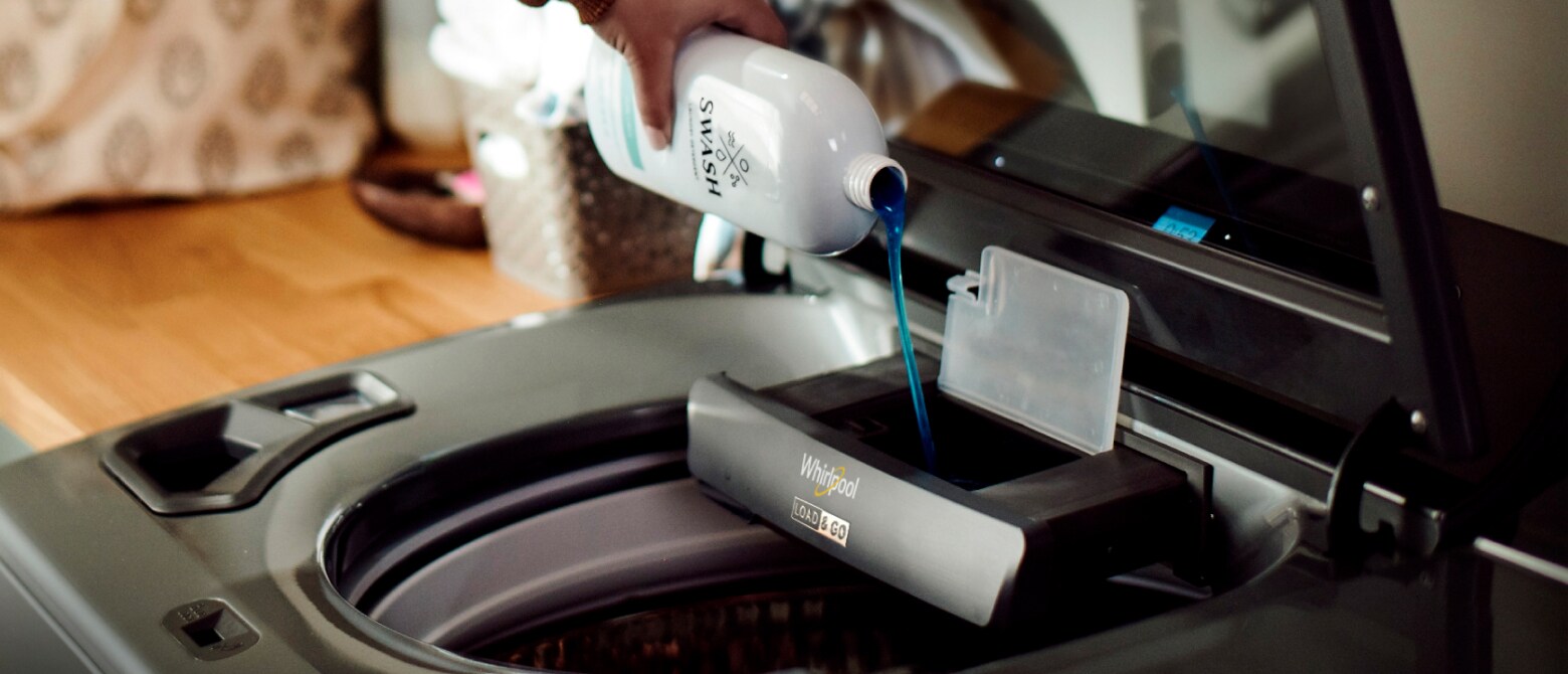 Swash™ Laundry Detergent being added to a Whirlpool® Load & Go™ Dispenser Swash™ Laundry Detergent being added to a Whirlpool® Load & Go™ Dispenser