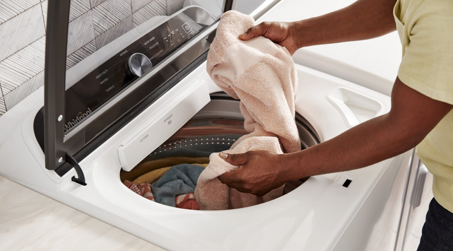 Person doing laundry