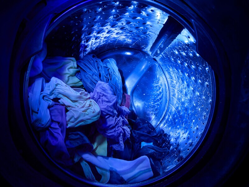 UV light shining inside of a washer 