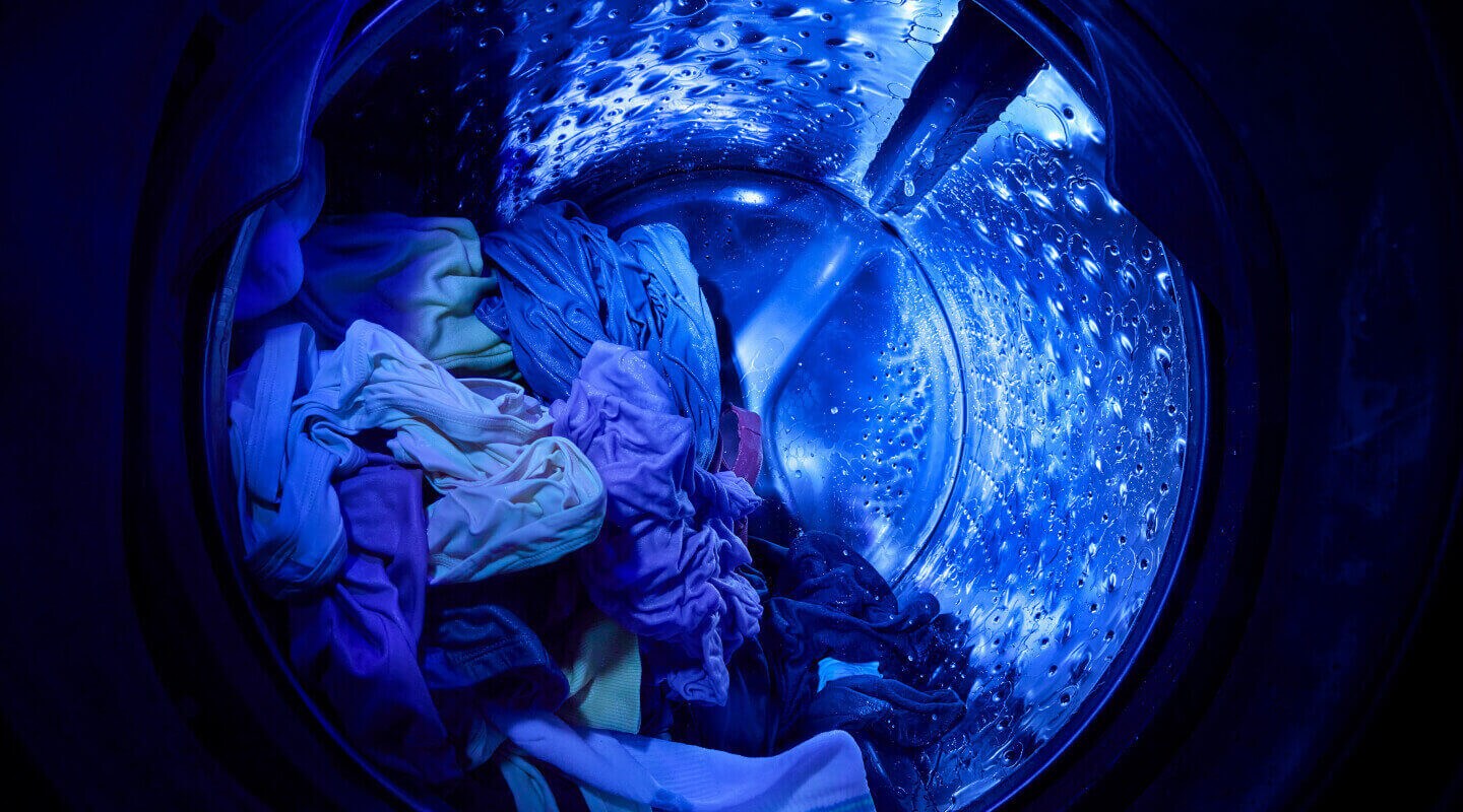 UV light shining inside of a washer 