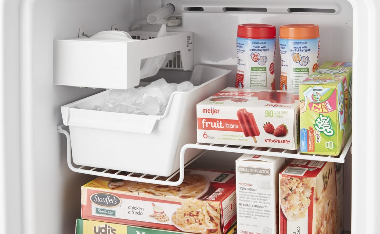 Freezer ice maker kit inside a freezer