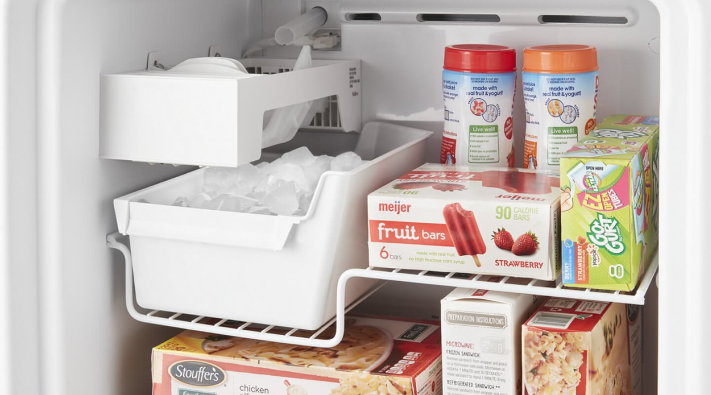 Freezer ice maker kit inside a freezer