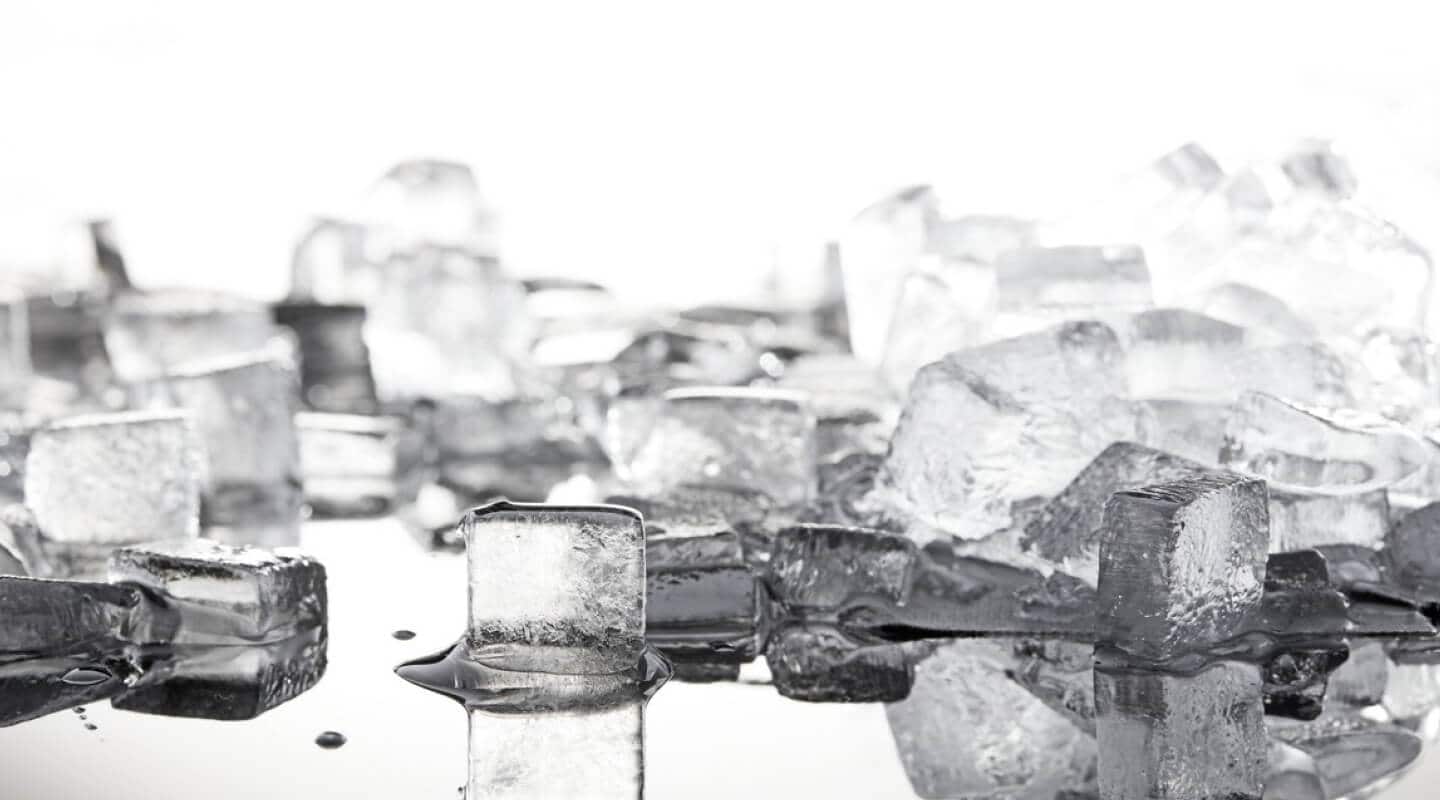 Ice cubes melting on a hard surface Ice cubes melting on a hard surface