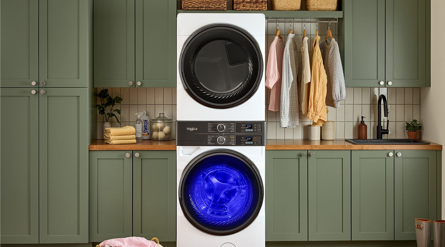 Whirlpool® Front Load Laundry Tower with UV Clean Technology shining in the washer