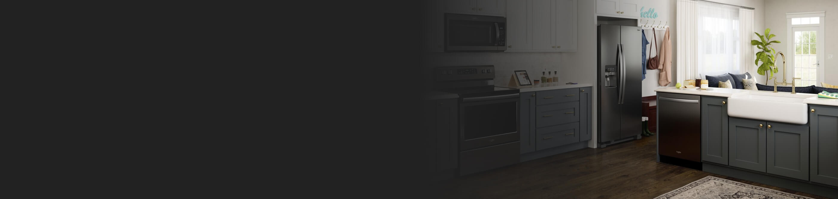A kitchen with blue cabinets and stainless steel appliances