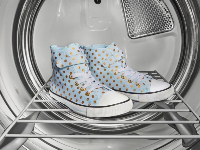 Shoes in a dryer drum Shoes in a dryer drum