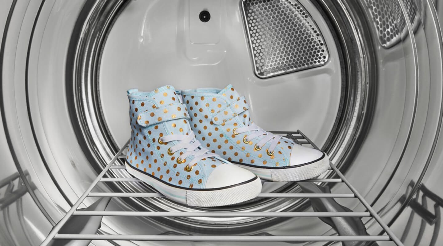 Shoes in a dryer drum Shoes in a dryer drum
