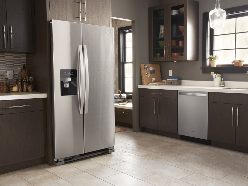 Modern kitchen with stainless steel side-by-side refrigerator Modern kitchen with stainless steel side-by-side refrigerator