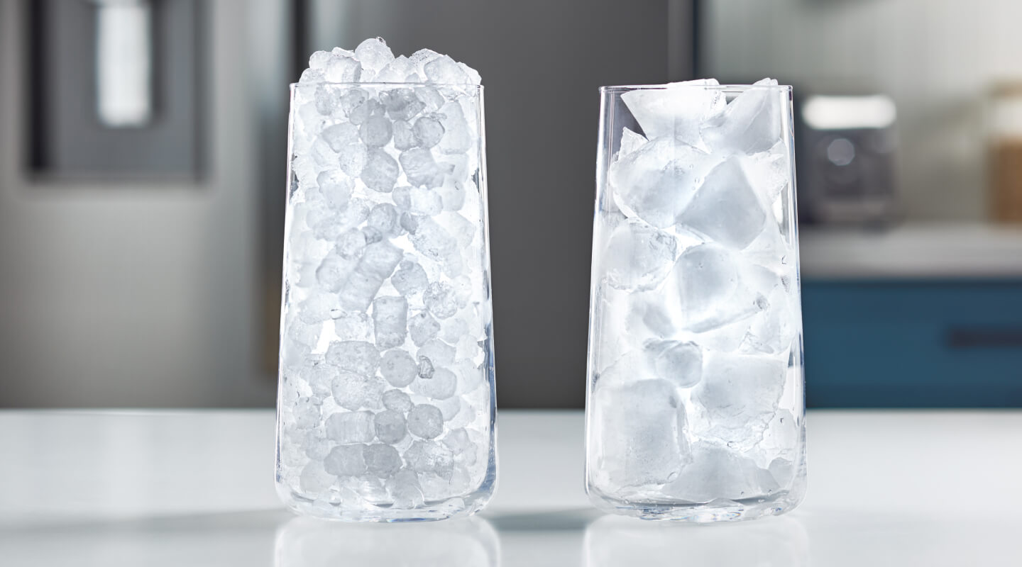 A glass full of nugget ice next to a glass full of traditional ice