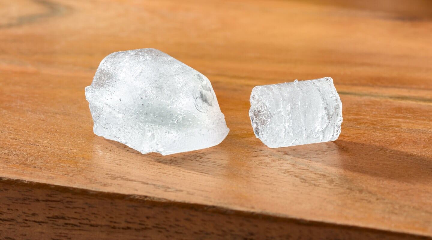 Two types of ice cubes on a table