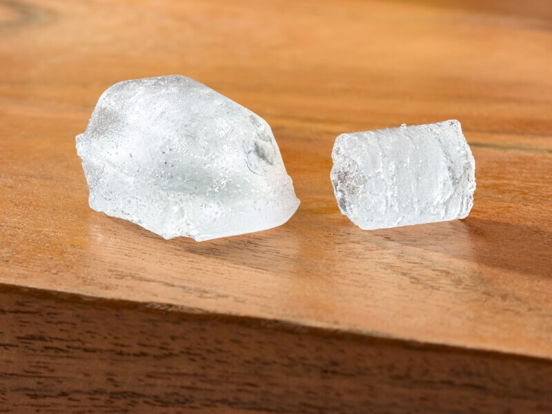 Two types of ice cubes on a table
