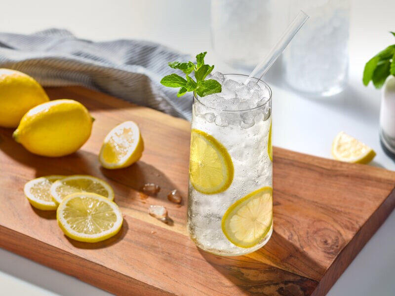 Lemon water in a glass with nugget ice