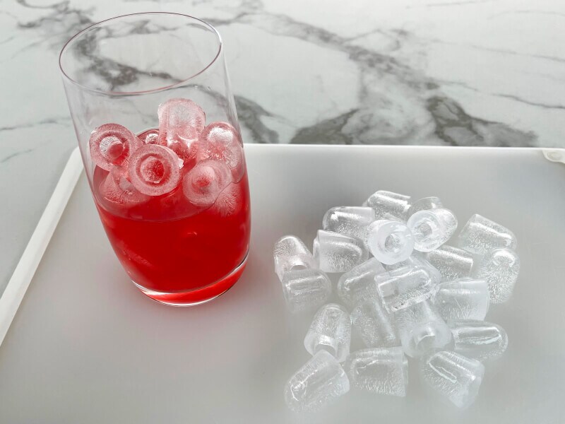 Bullet ice in a glass with punch