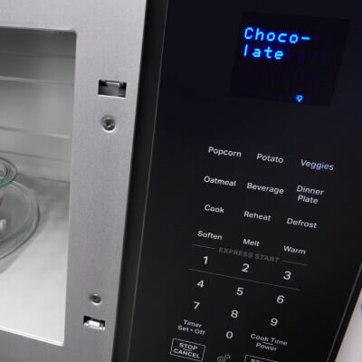 Microwave screen showing settings above the touchpad