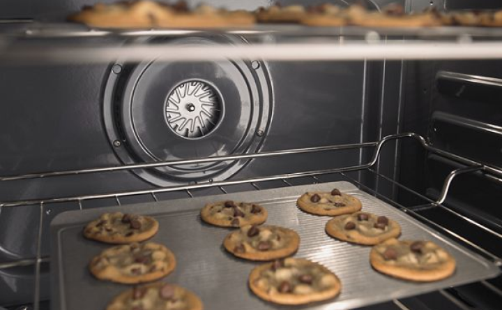 A pan of cookies in the oven