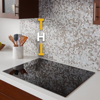 Diagram of height between cooking surface and cabinets