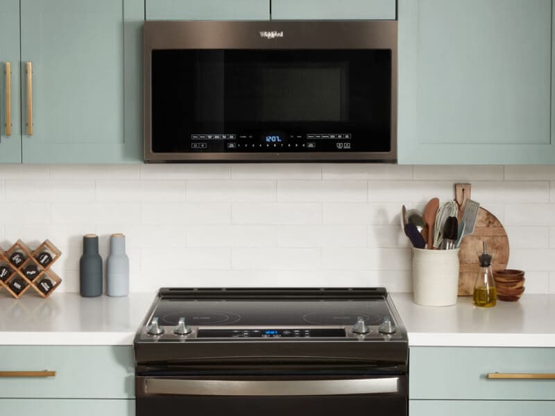 Whirlpool® over-the-range microwave installed above a Whirlpool® electric range Whirlpool® over-the-range microwave installed above a Whirlpool® electric range