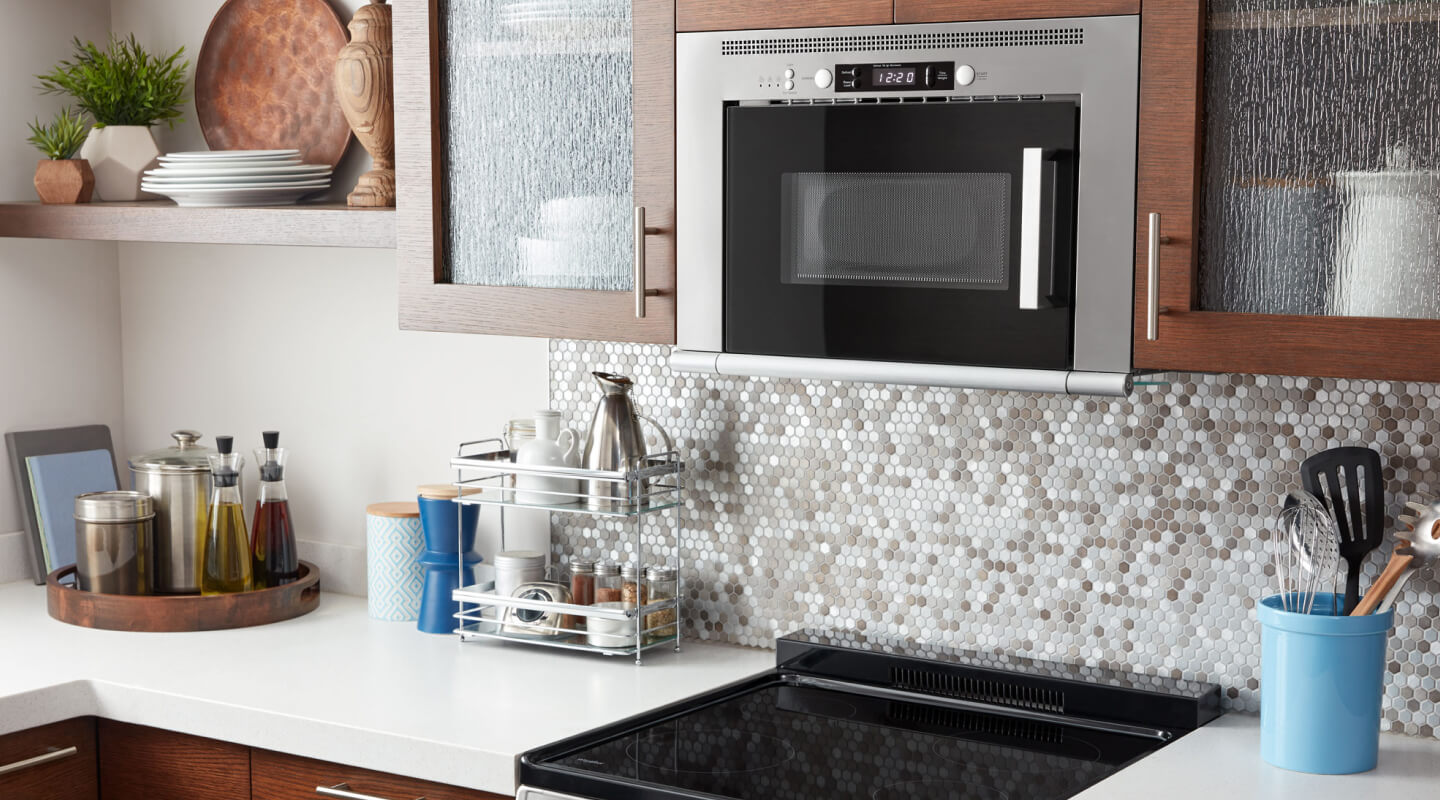 Whirlpool® over-the-range microwave installed above an electric cooktop Whirlpool® over-the-range microwave installed above an electric cooktop