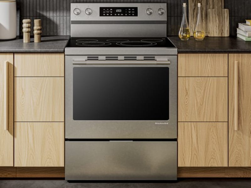 Front view of a range set in light cabinetry