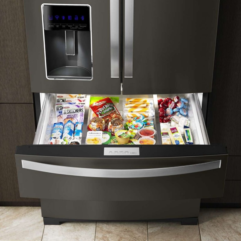 Whirlpool® Refrigerator with exterior drawer pulled out and full of food