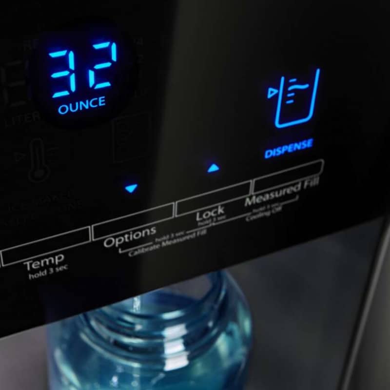 Close-up of a refrigerator water dispenser using the Measured Fill option