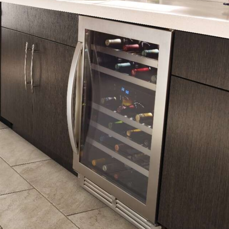 A Whirlpool® Undercounter Wine Refrigerator stocked with wine bottles